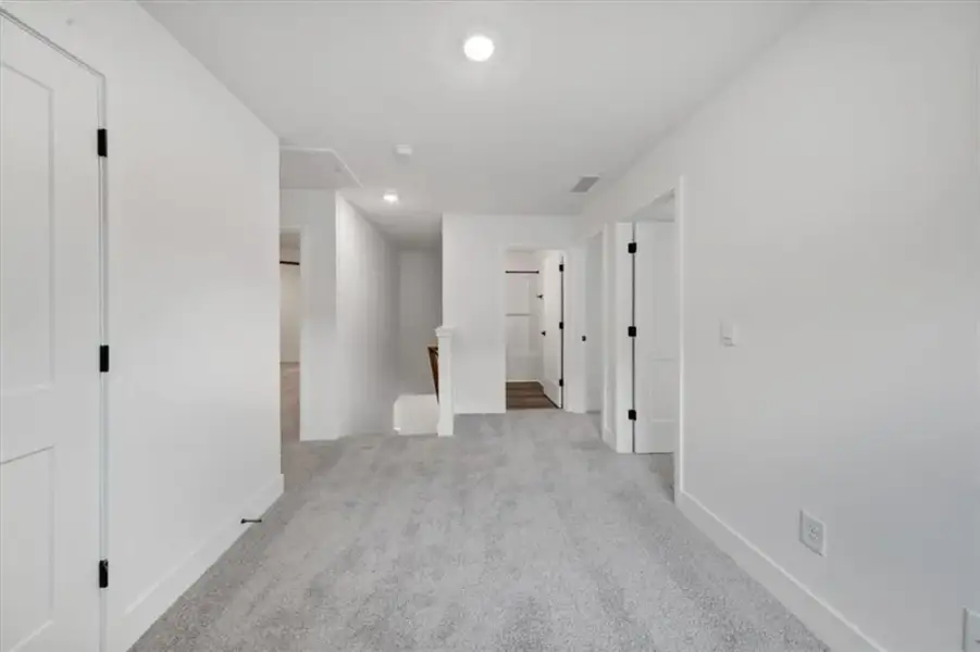 Spacious, unfurnished interior of a new home in Canterbury Villas, Carrollton (Image 31).
