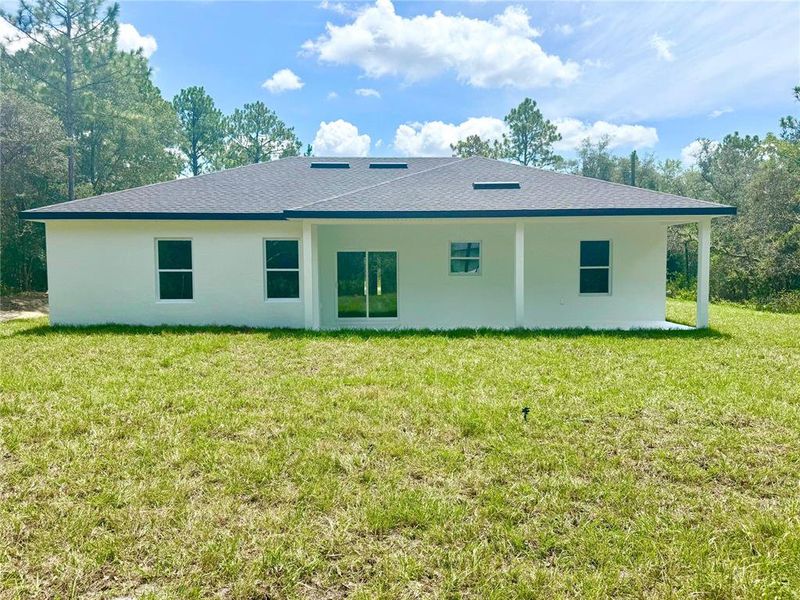 Front exterior of a new home in , Citrus Springs, FL, highlighting curb appeal (Image 20).