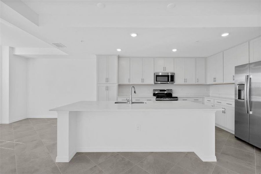 Furnished interior view inside a new home in Wellen Park Golf & Country Club, Venice (Image 11).