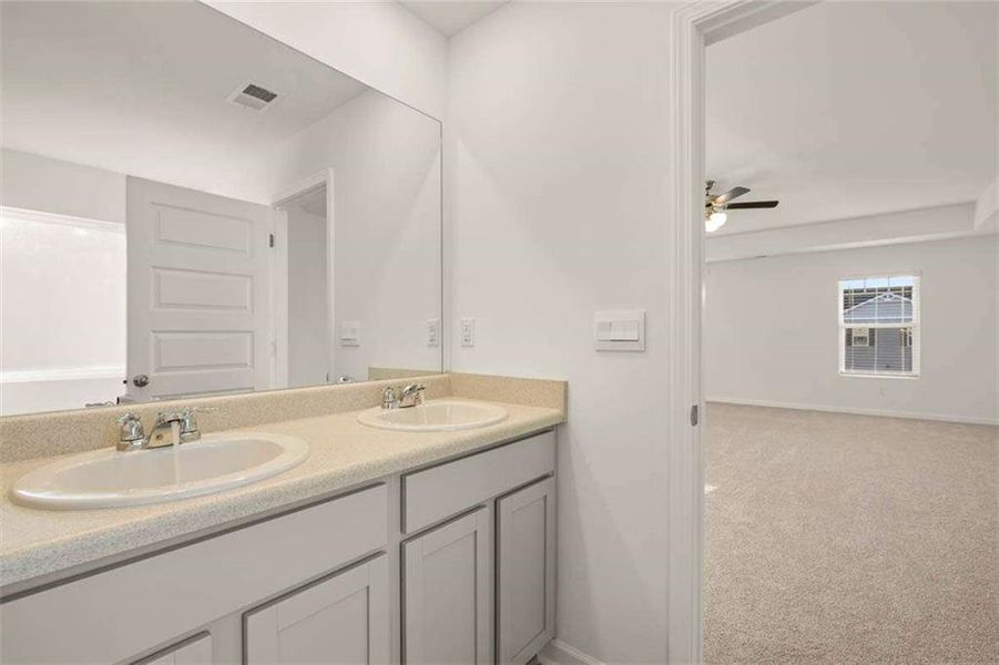 Furnished interior view inside a new home in Oakchase at Hampton, Hampton (Image 11).