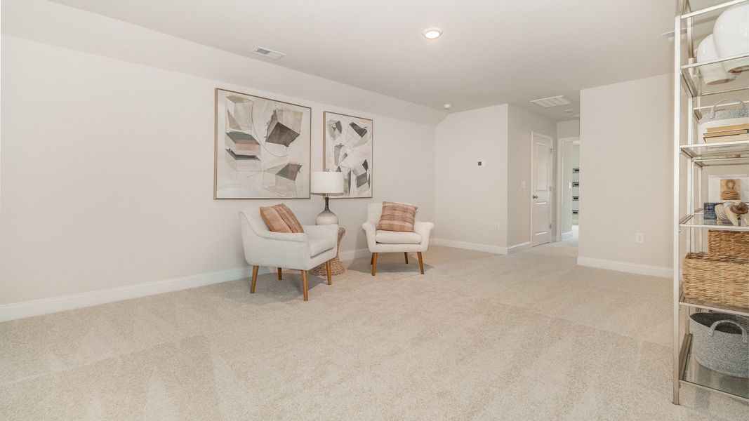 Furnished interior view inside a new home in The Preserve at Shaftesbury Glen, Conway (Image 11).