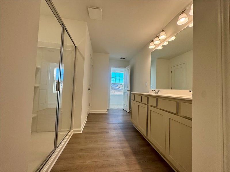 Furnished interior view inside a new home in Eastlyn Crossing, Flowery Branch (Image 10).