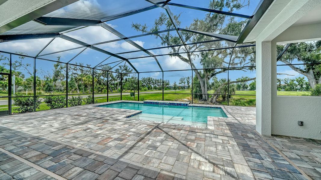 Exterior details and patio area of a home in Canoe Creek Real Estate and Homes for Sale in Parrish, FL - Neal Communities, Parrish (Image 24).