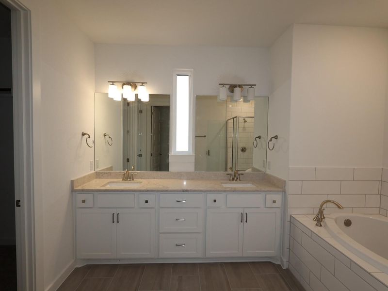 Furnished interior view inside a new home in Edgewood, Leander (Image 11). Furnished interior view inside a new home in Edgewood, Leander (Image 11).