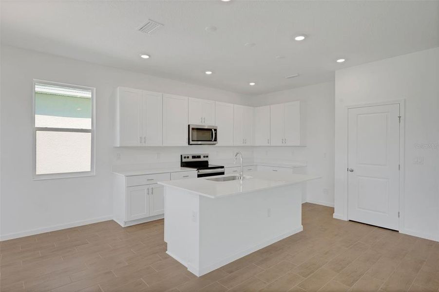 Furnished interior view inside a new home in Willowbrook North, Winter Haven (Image 11).