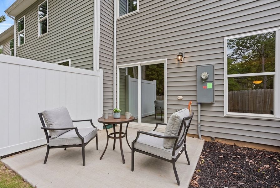 Exterior details and patio area of a home in East Main Townes, Spartanburg (Image 4).