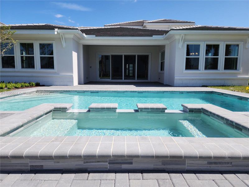 pool view with back patio