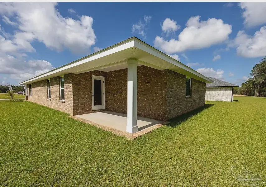 Exterior details and patio area of a home in Hidden Pines, Milton (Image 3).