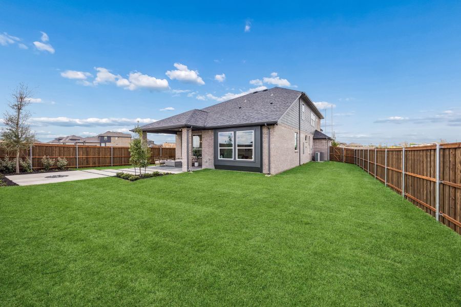 Exterior details and patio area of a home in Heartland, Heartland (Image 2). Exterior details and patio area of a home in Heartland, Heartland (Image 2).