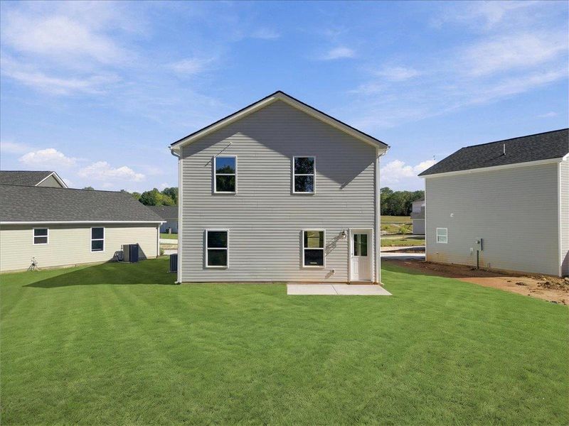 Exterior details and patio area of a home in Stones Throw, Inman (Image 19).