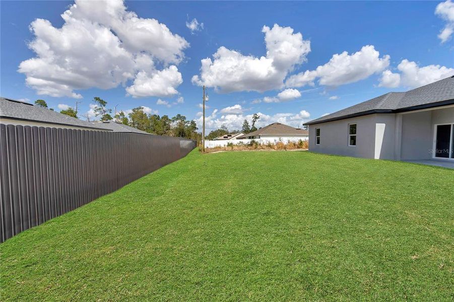 Exterior details and patio area of a home in , Ocala (Image 24).