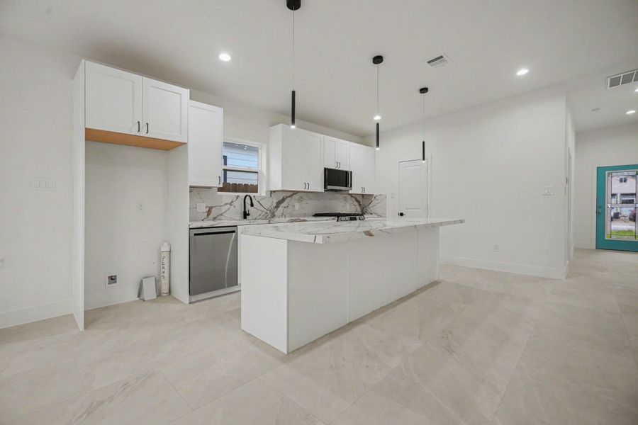 Another view of the kitchen