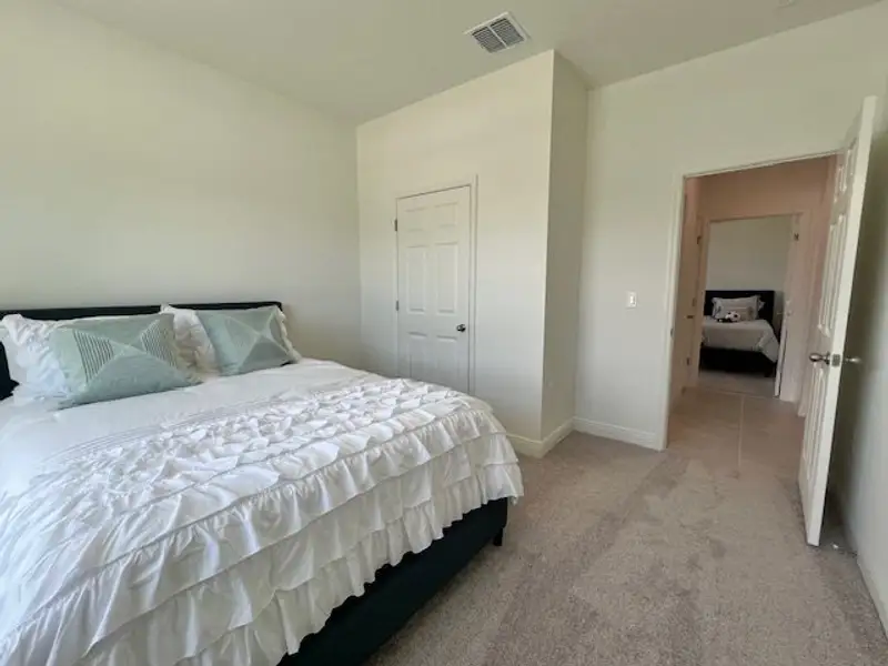 Furnished interior view inside a new home in Lakes At St Sebastian, Micco (Image 6).