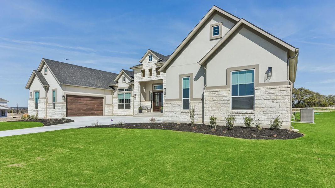 Representative exterior photo of a completed home built from the Garet by Chesmar Homes in Feathergrass, Florence, TX (Image 27).