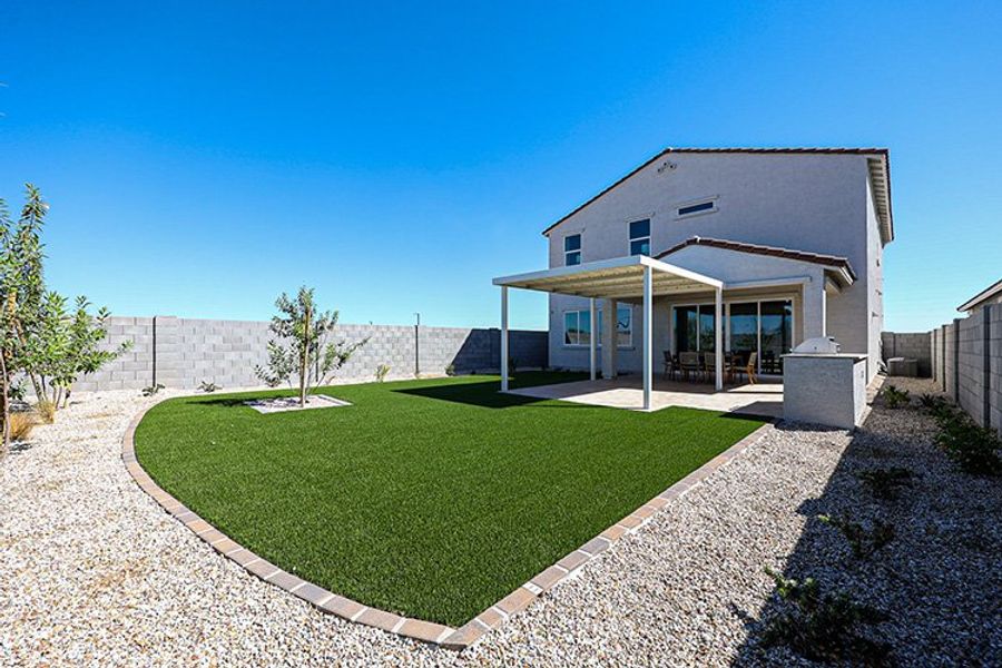 A house with a large front yard. A house with a large front yard.