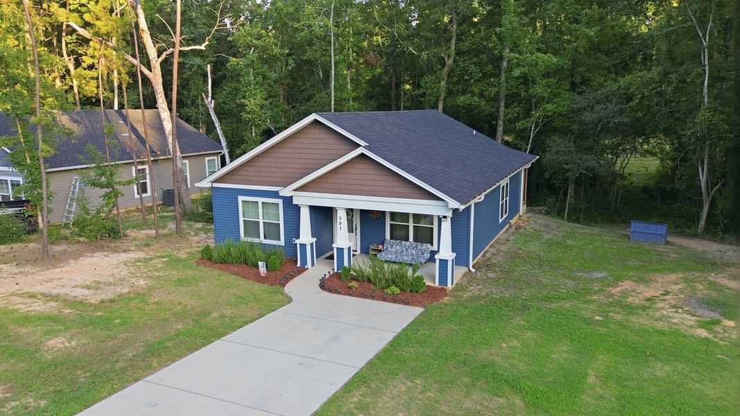 Front exterior of a new home in , St. Matthews, SC, highlighting curb appeal (Image 21).