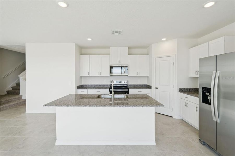 Furnished interior view inside a new home in Crosswinds - Classic Series, Haines City (Image 8).