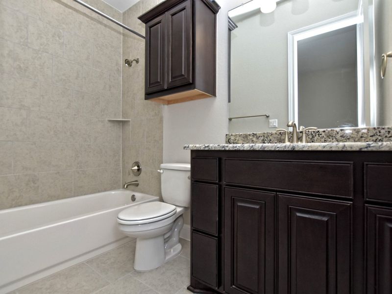 Representative furnished interior of a home built from the Siena III by Giddens Homes in Clearwater Ranch, Liberty Hill (Image 134).