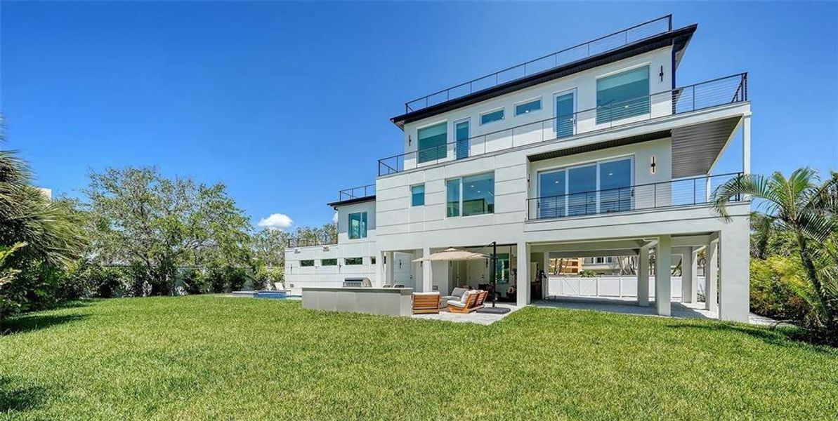 Exterior details and patio area of a home in , Sarasota (Image 23).