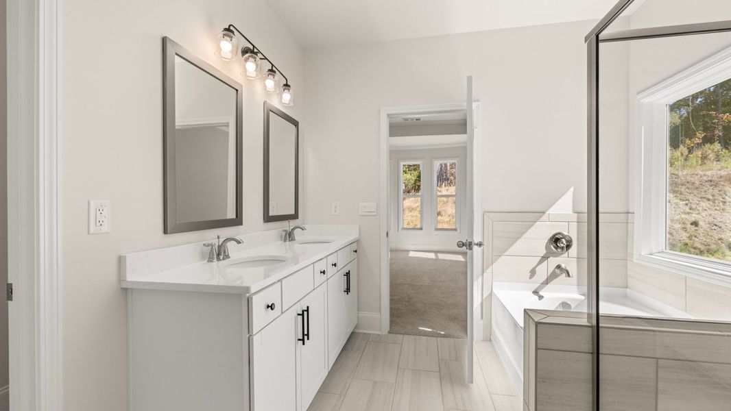 Representative furnished interior of a home built from the WINDSOR by D.R. Horton in Butner Estates, South Fulton (Image 17).