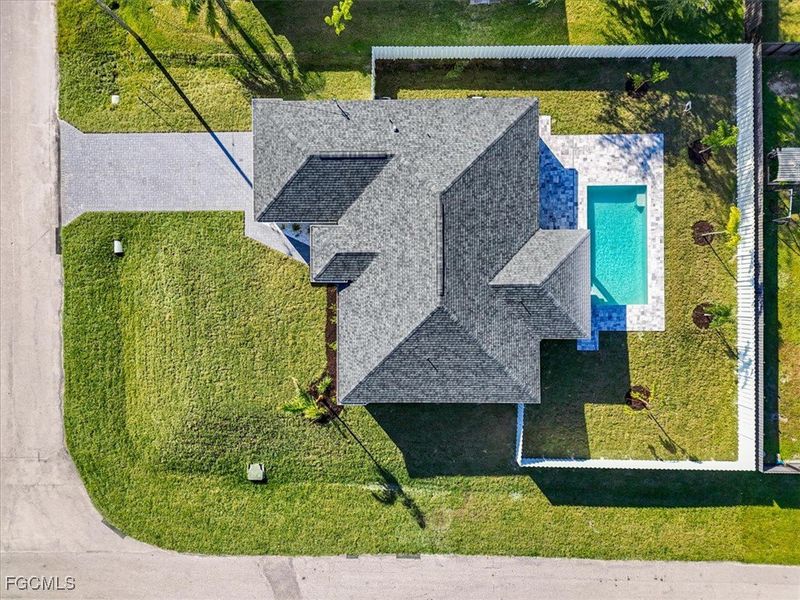 Front exterior of a new home in Cape Coral, Cape Coral, FL, highlighting curb appeal (Image 1).
