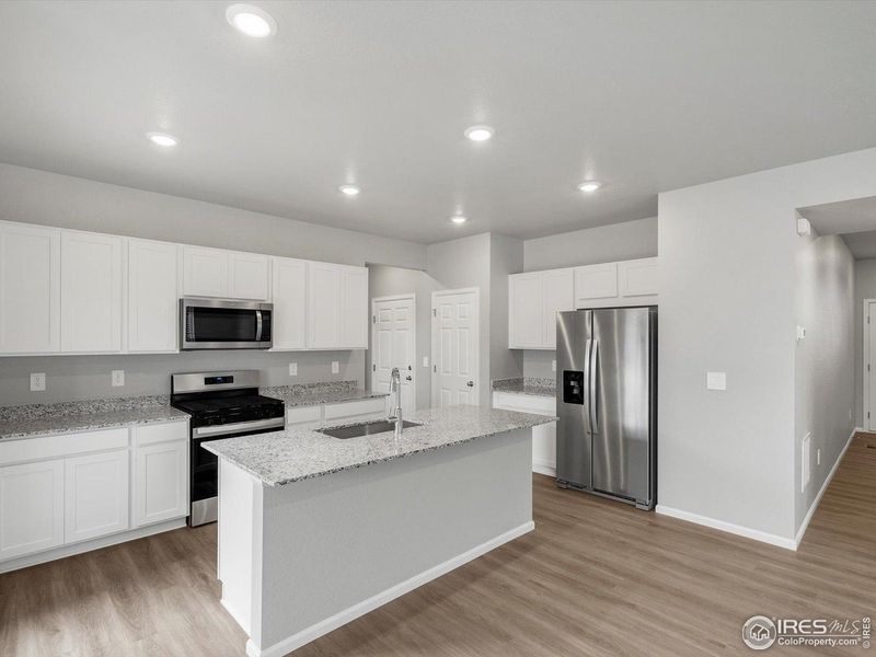 Furnished interior view inside a new home in Lake Bluff, Greeley (Image 5).