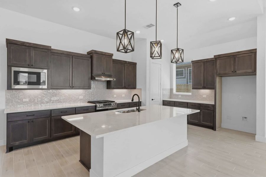 Representative furnished interior of a home built from the Palmer by Chesmar Homes in Riceland Alley Loads, Mont Belvieu (Image 5).