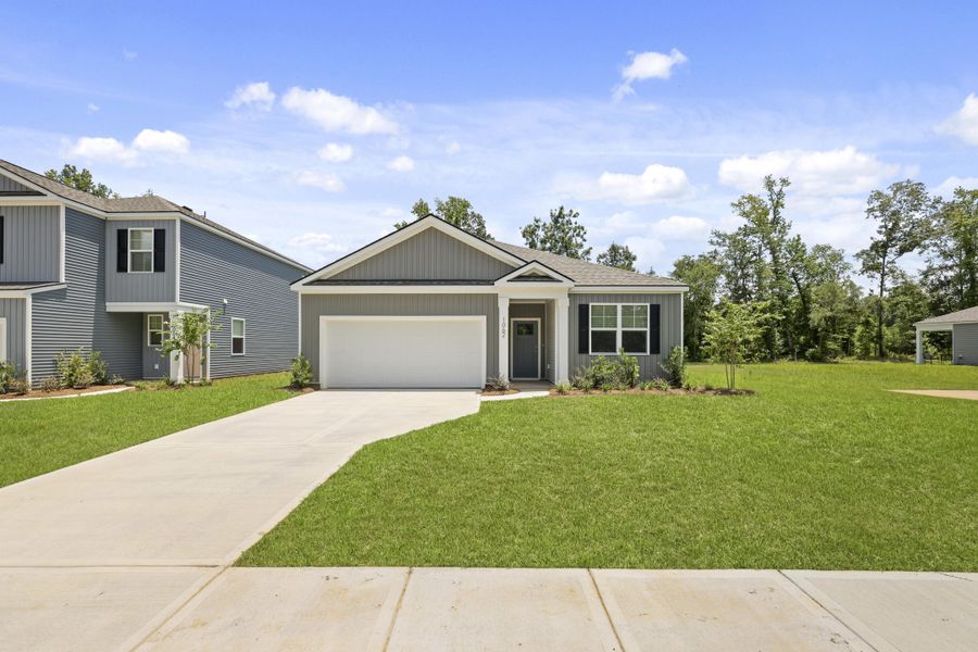 Front exterior of a new home in The Ranch, Holly Hill, SC, highlighting curb appeal (Image 1). Front exterior of a new home in The Ranch, Holly Hill, SC, highlighting curb appeal (Image 1).
