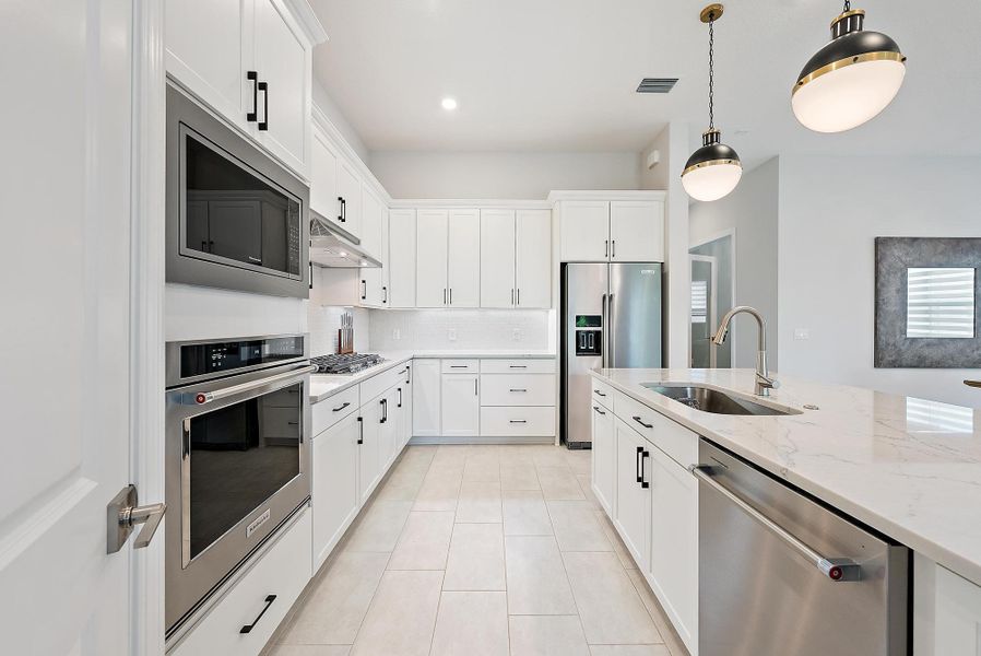 Furnished interior view inside a new home in Avondale at Avenir, Palm Beach Gardens (Image 15).