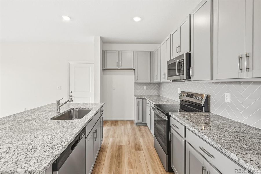 Furnished interior view inside a new home in Sky Ranch Villas, Watkins (Image 11).
