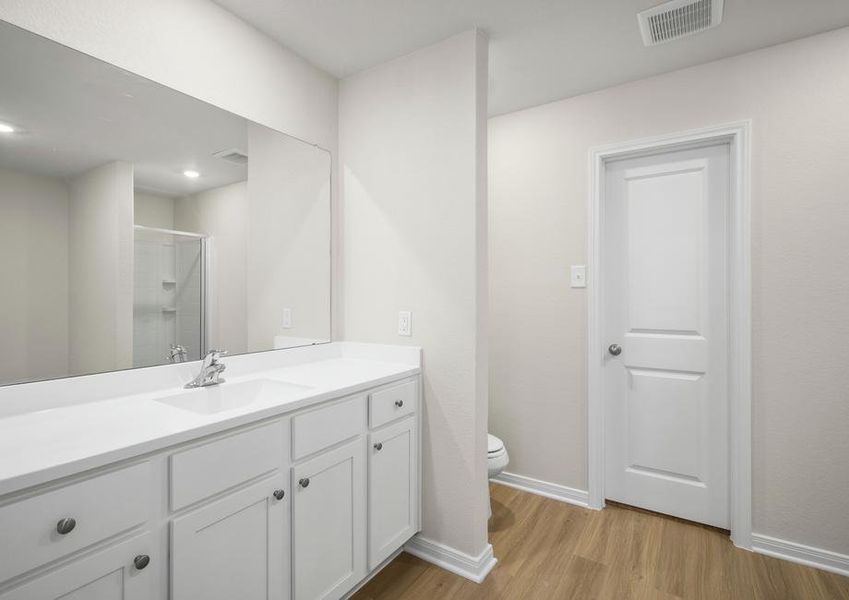 A long vanity in the master bathroom perfect for getting ready each morning.