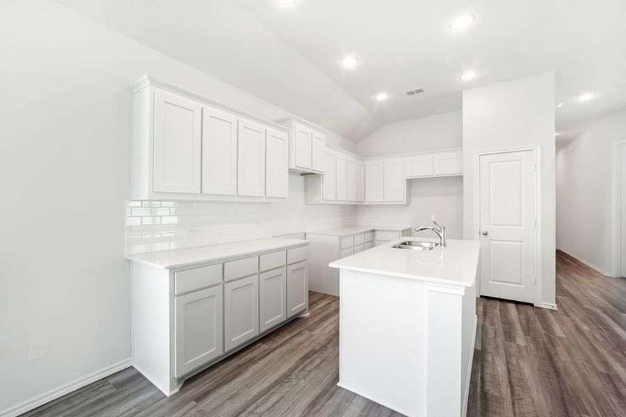 Representative exterior photo of a completed home built from the Bastrop by Impression Homes in Heartland, Heartland, TX (Image 7).