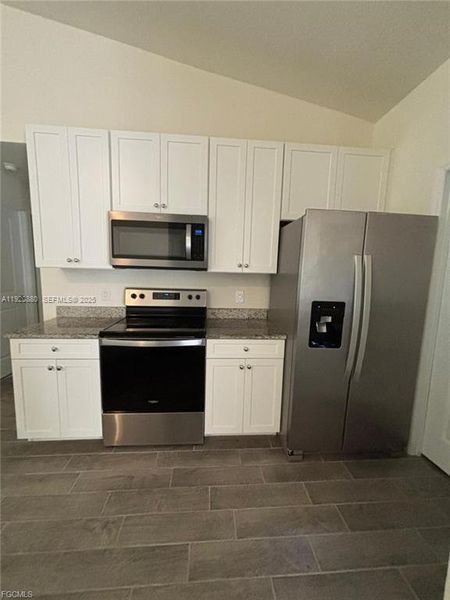 Furnished interior view inside a new home in , Lehigh Acres (Image 8).