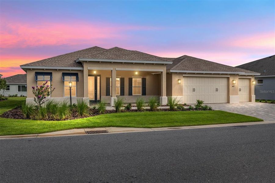 Front exterior of a new home in On Top of the World Communities, Ocala, FL, highlighting curb appeal (Image 1). Front exterior of a new home in On Top of the World Communities, Ocala, FL, highlighting curb appeal (Image 1).