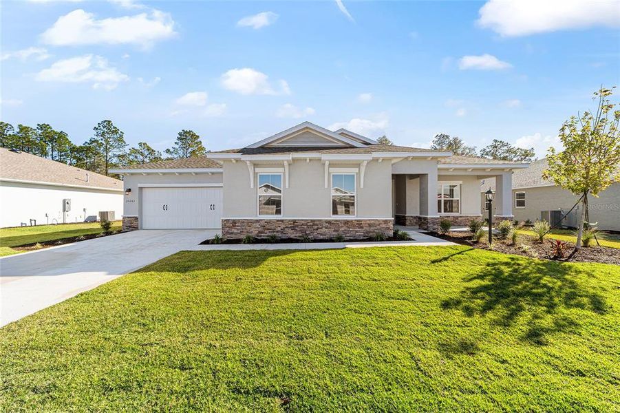Front exterior of a new home in , Ocala, FL, highlighting curb appeal (Image 21). Front exterior of a new home in , Ocala, FL, highlighting curb appeal (Image 21).