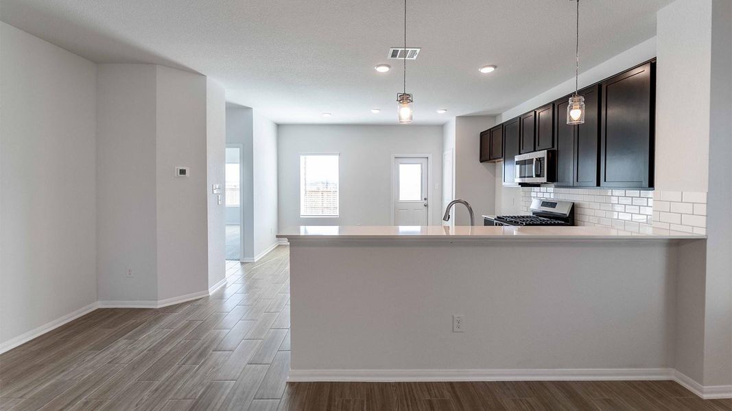 Furnished interior view inside a new home in Briarwood, Elgin (Image 5).