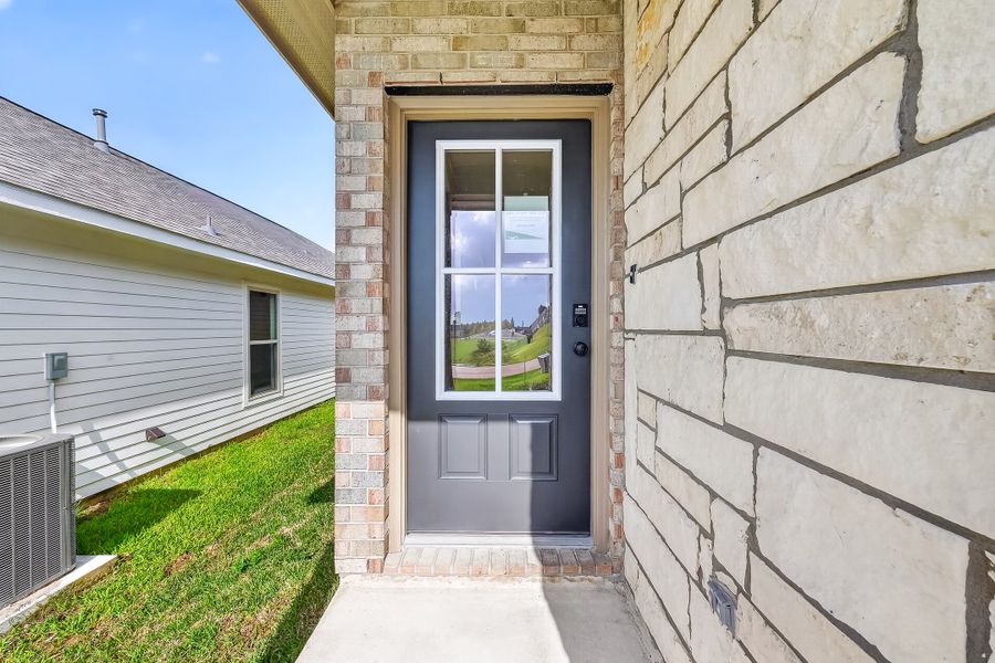 Exterior details and patio area of a home in Mostyn Springs, Magnolia (Image 3).