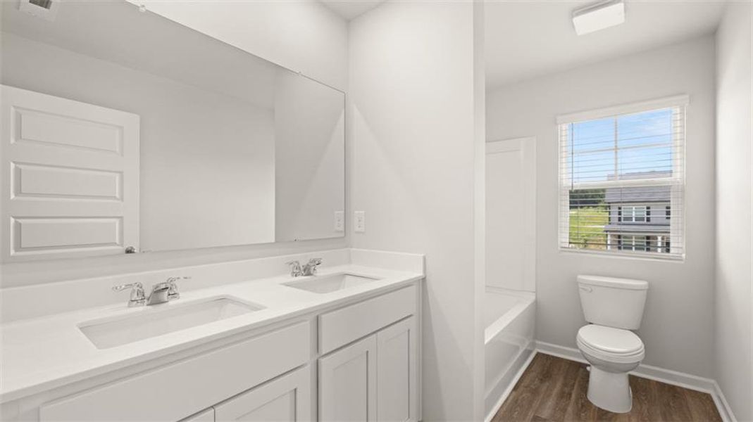 Furnished interior view inside a new home in Locust Grove Station - Cedar Ridge, Locust Grove (Image 10).
