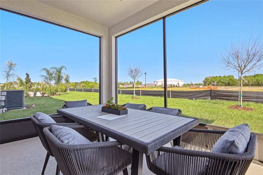 Exterior details and patio area of a home in Seaport Village, Tavares (Image 22).