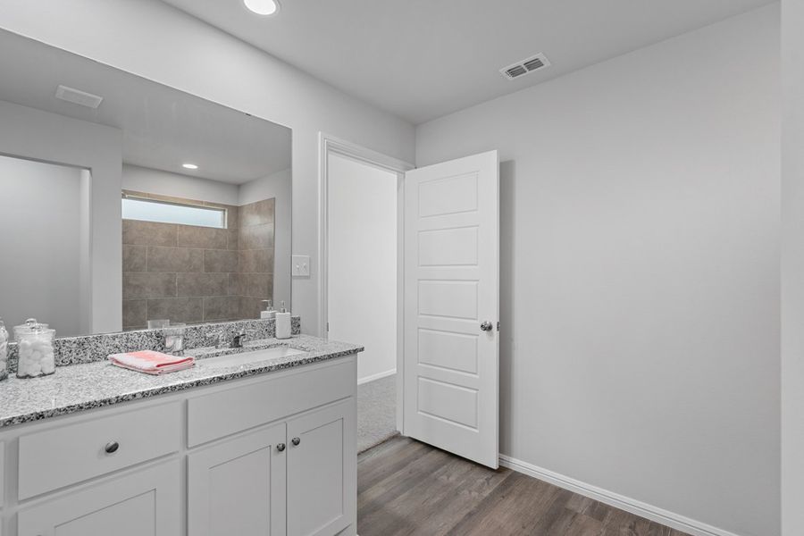 Representative furnished interior of a home built from the BELLVUE by D.R. Horton in Faculty Row, Abilene (Image 24).