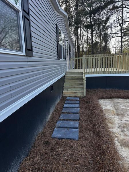 Exterior details and patio area of a home in , Holly Hill (Image 8).