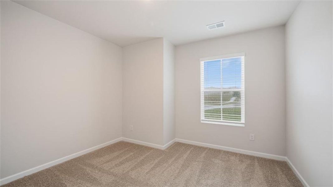 Spacious, unfurnished interior of a new home in Brookland Commons, Monroe (Image 22).