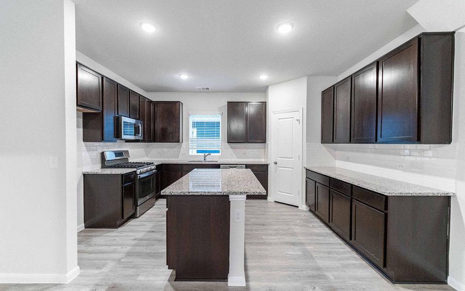 Furnished interior view inside a new home in Brooklands, Hutto (Image 2).