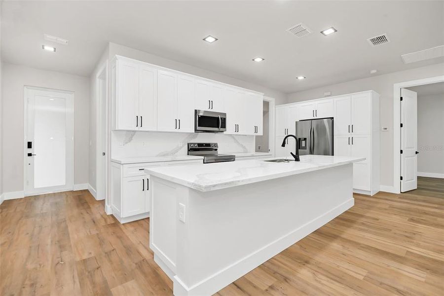 Furnished interior view inside a new home in , Dunnellon (Image 6).
