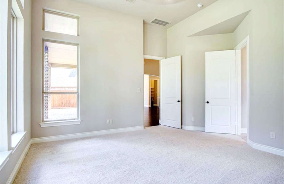 Representative unfurnished interior of a home built from the 4198 by Ravenna Homes in The Woodlands Hills 65′, Willis (Image 24).