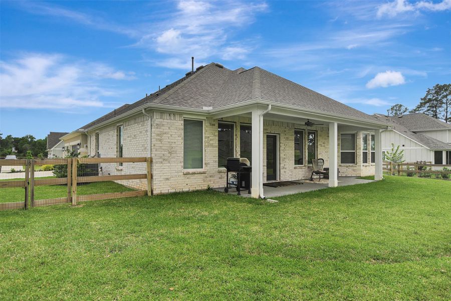 Exterior details and patio area of a home in Lone Star Landing, Montgomery (Image 24).