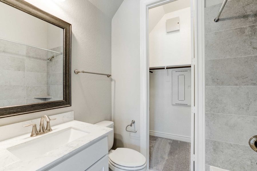 Representative furnished interior of a home built from the 2688 by Ravenna Homes in The Woodlands Hills 65′, Willis (Image 11).