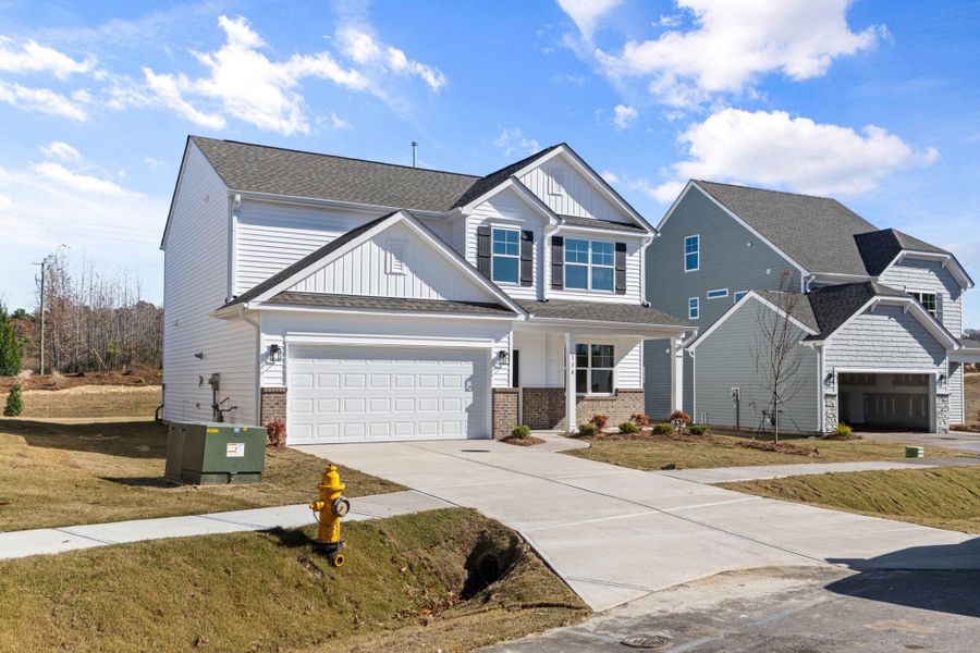 Front exterior of a new home in Monterra, Kernersville, NC, highlighting curb appeal (Image 2).