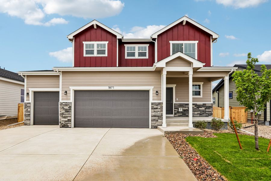 Front exterior of a new home in Granary, Johnstown, CO, highlighting curb appeal (Image 2). Front exterior of a new home in Granary, Johnstown, CO, highlighting curb appeal (Image 2).