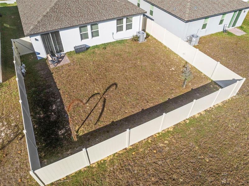 Exterior details and patio area of a home in Deer Run at Crosswinds, Davenport (Image 33).